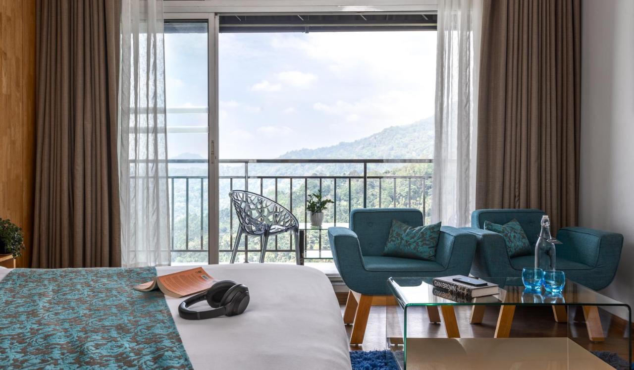ザ パノラミック ゲートウェイ ホテル ムンナール エクステリア 写真 A room at the hotel