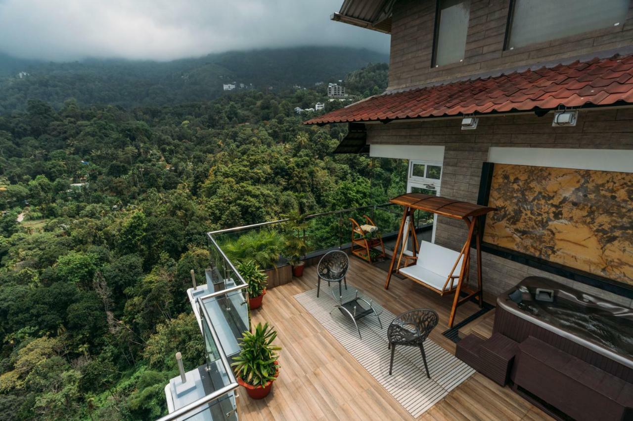 ザ パノラミック ゲートウェイ ホテル ムンナール エクステリア 写真 A view from the balcony of a house in Kerala, India