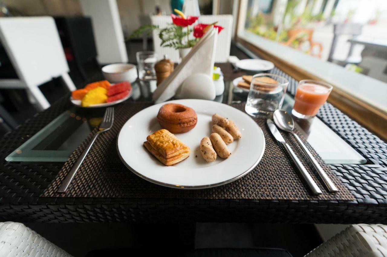 ザ パノラミック ゲートウェイ ホテル ムンナール エクステリア 写真 A breakfast table at a hotel